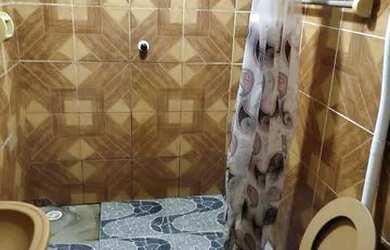 Imagem: A casa possui 3 Dormitórios, 2 Banheiros, 1 Vaga na garagem