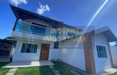 Imagem: A casa possui 3 Dormitórios, 4 Banheiros, 5 Vagas na garagem