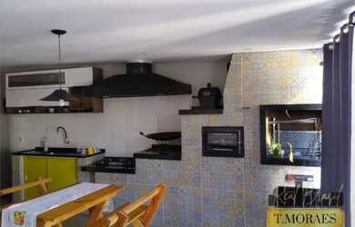 Imagem: A casa possui 4 Dormitórios, 4 Banheiros, 2 Vagas na garagem