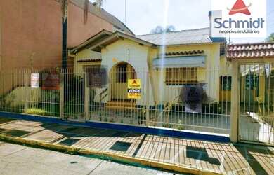 Imagem: A casa possui 5 Dormitórios, 4 Banheiros, 2 Vagas na garagem