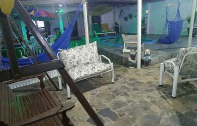 Imagem: A casa possui 3 Dormitórios, 2 Banheiros, 3 Vagas na garagem