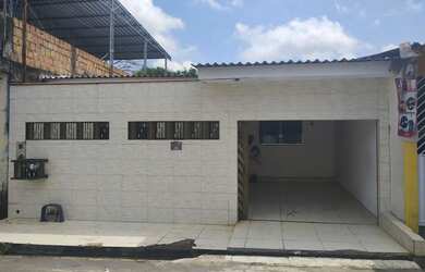 Imagem: A casa possui 2 Dormitórios, 2 Banheiros, 1 Vaga na garagem