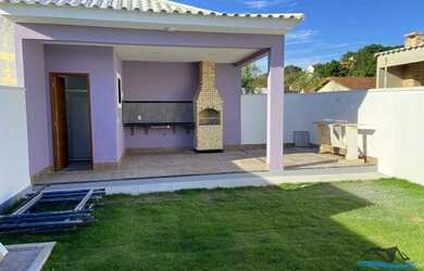 Imagem: A casa possui 2 Dormitórios, 3 Banheiros, 2 Vagas na garagem