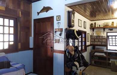 Imagem: A casa em condomínio possui 4 Dormitórios, 2 Banheiros, 2