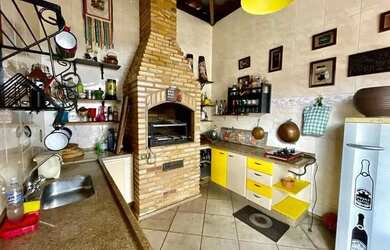 Imagem: A casa possui 4 Dormitórios, 4 Banheiros, 3 Vagas na garagem