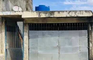 Imagem: A casa possui 2 Dormitórios, 1 Banheiro, 1 Vaga na garagem