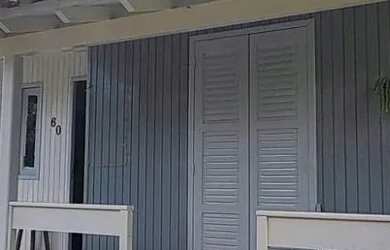 Imagem: A casa possui 2 Dormitórios, 1 Banheiro, 2 Vagas na garagem