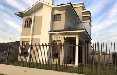 Imagem 2: Casa a venda de 3 dormitórios com suíte no bairro Pé de Plátano, Santa...