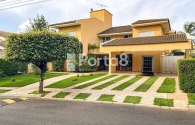 Imagem: A casa em condomínio possui 4 Dormitórios, 5 Banheiros, 4