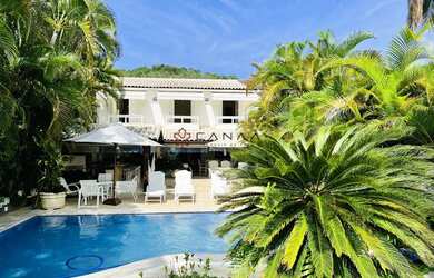 Imagem: A casa em condomínio possui 5 Dormitórios, 5 Banheiros, 2