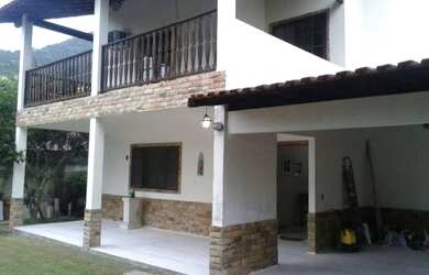 Imagem: A casa em condomínio possui 4 Dormitórios, 2 Vagas na garagem