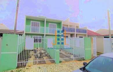 Imagem: A casa possui 2 Dormitórios, 1 Banheiro, 2 Vagas na garagem