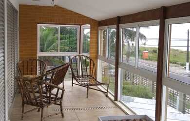 Imagem 13: casa frente para o mar com piscina