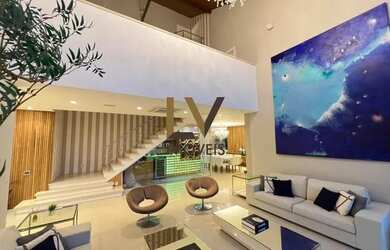 Imagem: A casa em condomínio possui 4 Dormitórios, 5 Banheiros, 700m²