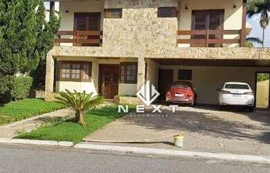 Imagem: A casa em condomínio possui 4 Dormitórios, 5 Banheiros, 4