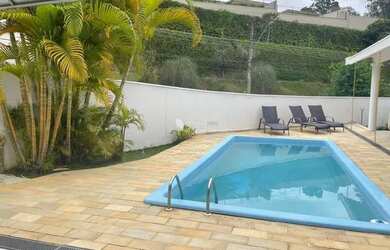 Imagem: A casa em condomínio possui 3 Dormitórios, 4 Banheiros, 2