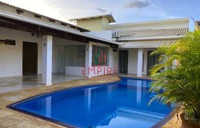 Imagem: A casa possui 4 Dormitórios, 5 Banheiros, 4 Vagas na garagem