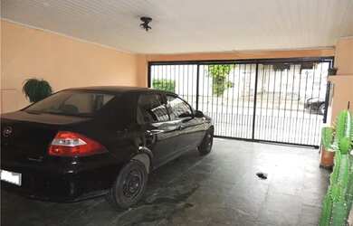 Imagem: A casa possui 2 Dormitórios, 3 Banheiros, 2 Vagas na garagem