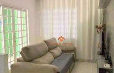 Imagem: A casa possui 3 Dormitórios, 2 Banheiros, 2 Vagas na garagem