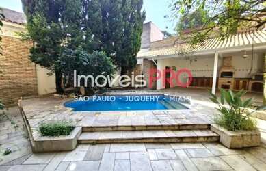 Imagem: A casa possui 5 Dormitórios, 5 Banheiros, 5 Vagas na garagem