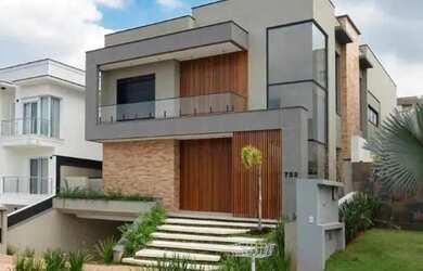 Imagem: A casa em condomínio possui 4 Dormitórios, 3 Banheiros, 5