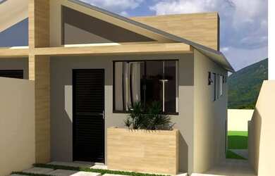 Imagem: A casa possui 3 Dormitórios, 3 Banheiros, 2 Vagas na garagem