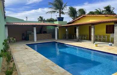 Imagem: A casa possui 4 Dormitórios, 5 Vagas na garagem e está localizado