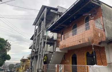 Imagem: A casa possui 4 Dormitórios, 3 Banheiros, 5m² de Área e