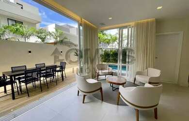 Imagem: A casa em condomínio possui 4 Dormitórios, 5 Banheiros, 5