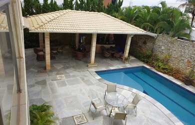 Imagem: A casa em condomínio possui 5 Dormitórios, 5 Banheiros, 4