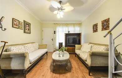 Imagem: A casa possui 3 Dormitórios, 2 Banheiros, 1 Vaga na garagem