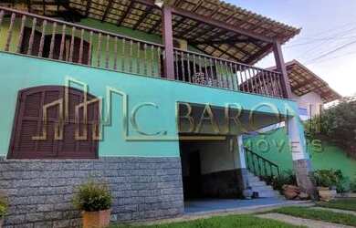 Imagem: A casa possui 5 Dormitórios, 3 Banheiros, 5 Vagas na garagem