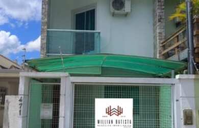 Imagem: A casa possui 2 Dormitórios, 3 Banheiros, 1 Vaga na garagem