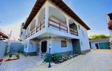 Imagem: A casa possui 4 Dormitórios, 4 Banheiros, 4 Vagas na garagem