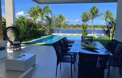 Imagem: A casa em condomínio possui 4 Dormitórios, 5 Banheiros, 4