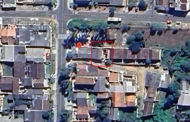 Imagem: A casa possui 3 Dormitórios, 1 Banheiro, 60m² de Área e