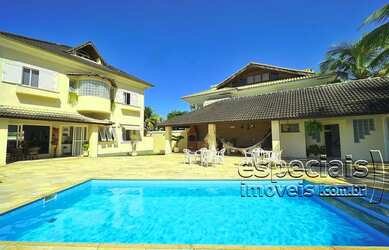 Imagem: A casa em condomínio possui 5 Dormitórios, 5 Banheiros, 4