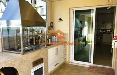 Imagem: A casa em condomínio possui 4 Dormitórios, 5 Banheiros, 5