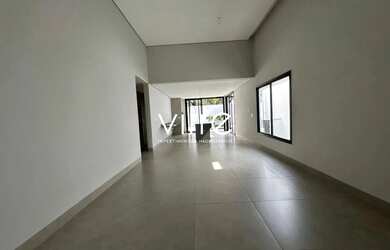 Imagem: A casa possui 3 Dormitórios, 5 Banheiros, 4 Vagas na garagem