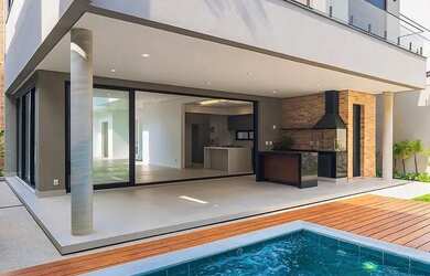 Imagem: A casa em condomínio possui 5 Dormitórios, 5 Banheiros, 4