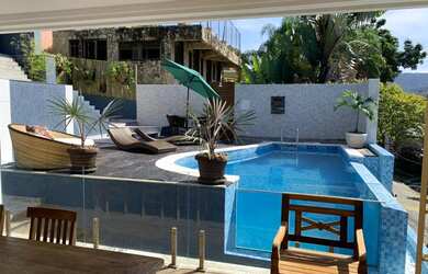 Imagem 2: Casa de condomínio para venda possui 377 metros quadrados com 4 quartos