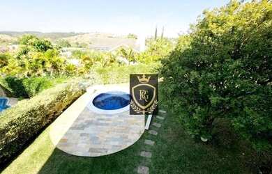 Imagem: A casa em condomínio possui 4 Dormitórios, 5 Banheiros, 5