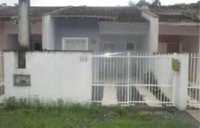 Imagem: A casa possui 2 Dormitórios, 1 Banheiro, 1 Vaga na garagem