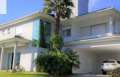 Imagem: A casa em condomínio possui 4 Dormitórios, 4 Banheiros, 4