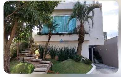 Imagem: A casa em condomínio possui 4 Dormitórios, 5 Banheiros, 5