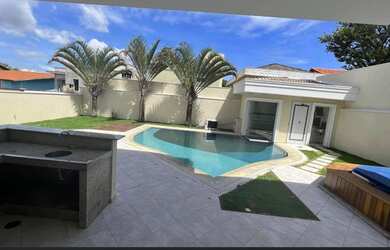 Imagem: A casa em condomínio possui 4 Dormitórios, 3 Banheiros, 5