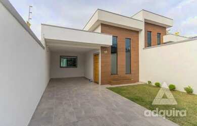 Imagem: A casa possui 3 Dormitórios, 2 Banheiros, 1 Vaga na garagem