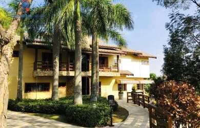 Imagem: A casa em condomínio possui 5 Dormitórios, 5 Banheiros, 5