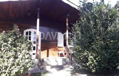 Imagem: A casa em condomínio possui 5 Dormitórios, 4 Banheiros, 2