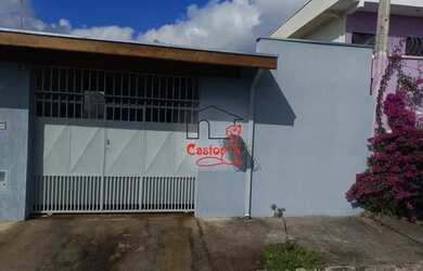 Imagem: A casa possui 3 Dormitórios, 2 Banheiros, 2 Vagas na garagem